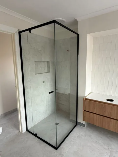 Semi-frameless black shower screen