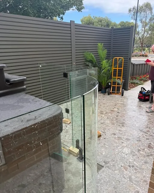 Curved glass spa barrier